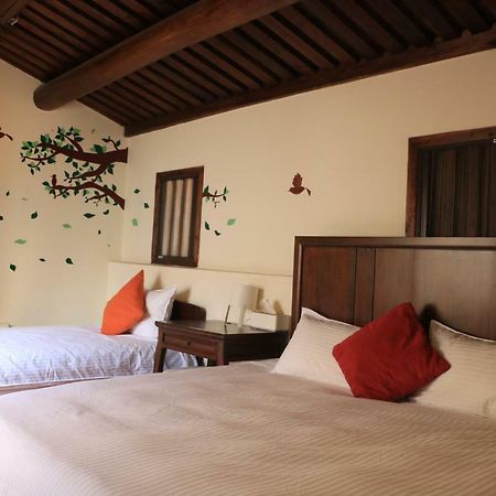 Longmen Inn Bed And Breakfast Jinning Esterno foto