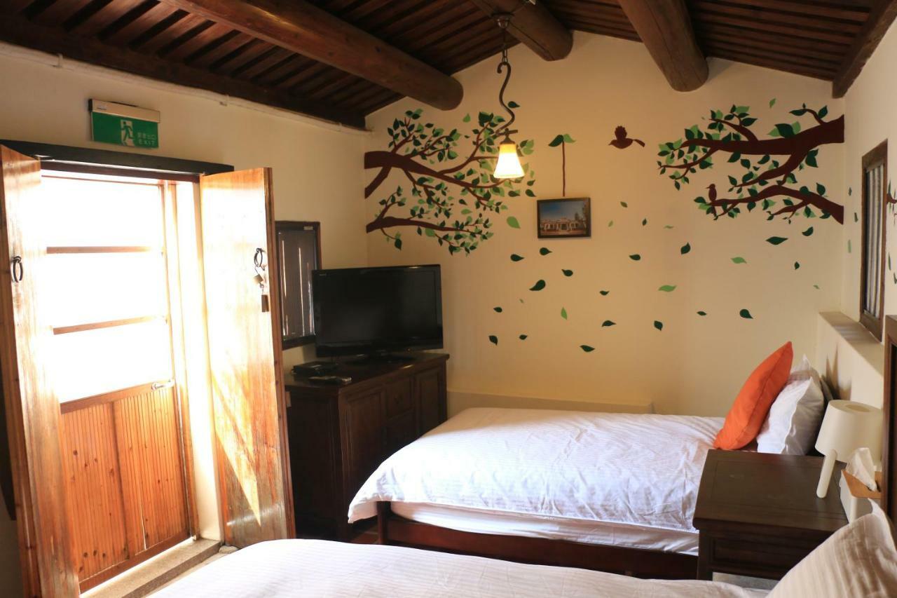 Longmen Inn Bed And Breakfast Jinning Esterno foto